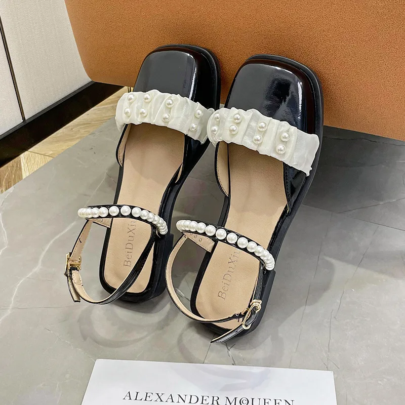 

Fashion Foreign Style Pearl Flat Sandals Female 2023 New Fairy Wind One Word Ribbon Baida Square Head Baotou Sandals