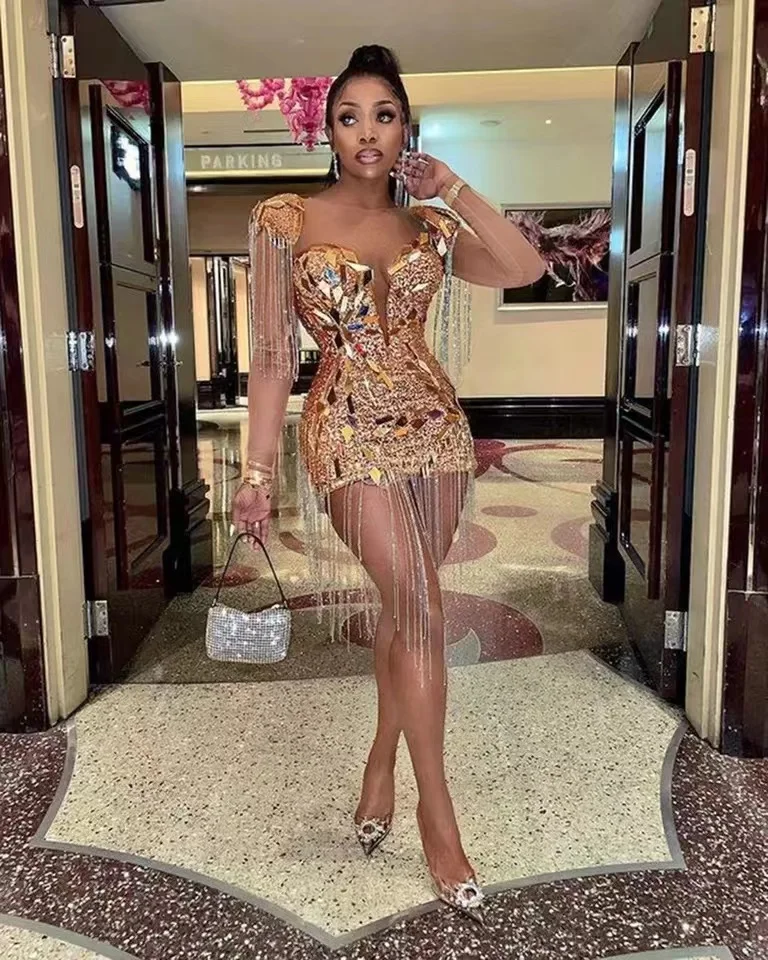 

Glitter Short Prom Dresses For Black Girls Sheer Neck Long Sleeve Mini Bodycon Evening Party Gowns Birthday Dress Tassel Sequins