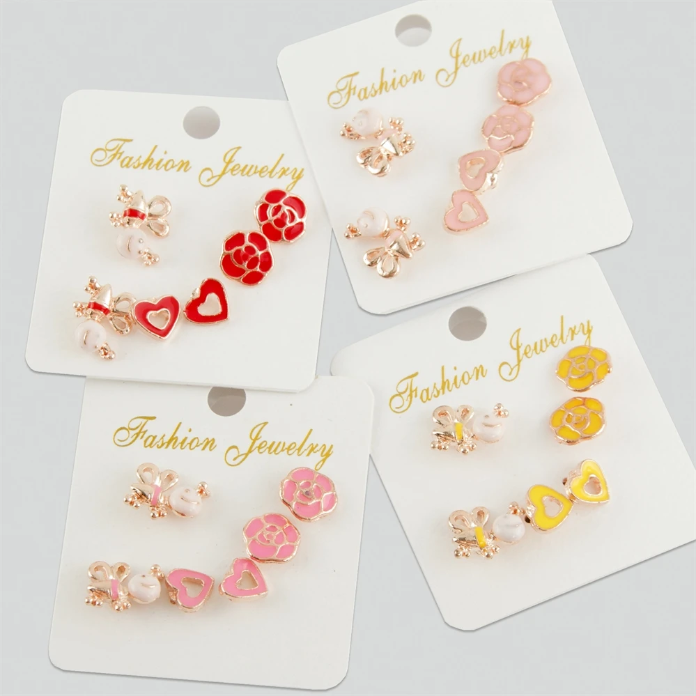 

Серьги-кабошоны с розовыми фигурками, 6 шт.