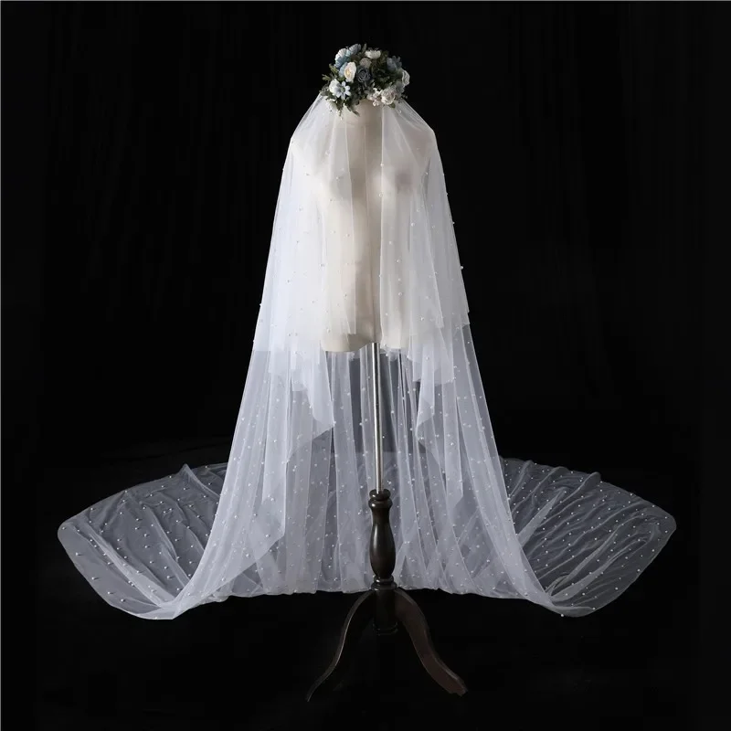 

Фата свадебная двухслойная с гребнем и жемчугом