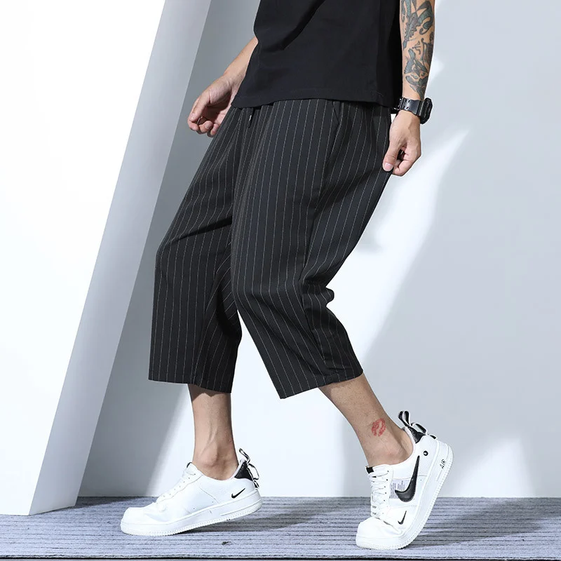 

Мужская одежда больших размеров 80-140 кг, брендовые полосатые повседневные спортивные брюки, свободные прямые брюки длиной до щиколотки, мужские брюки, размер 5XL 6XL