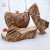 qsgfc gold color elegant and delicate paisley pattern metal decoration ladies middle heel sandals shoes bag set