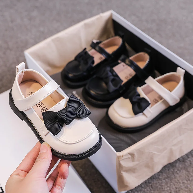 

Children's leather shoes girls 2022 autumn new Korean version of the bow thick bottom black campus leather shoes fashion