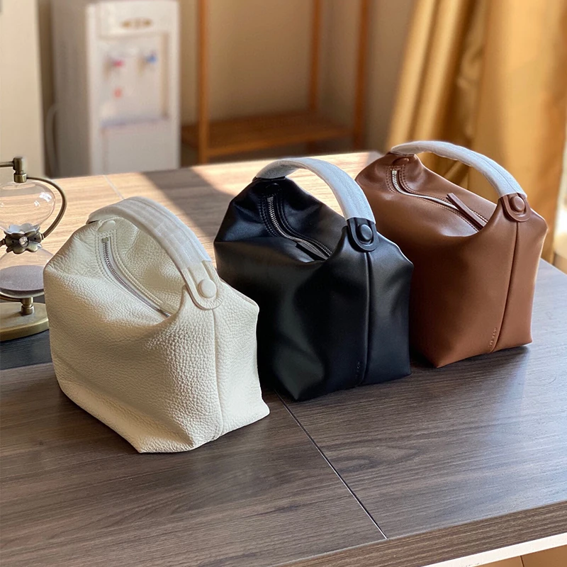 Купи New leather minimalist ins style hand bag lunch box bag hand bag mini portable women's bag за 4,873 рублей в магазине AliExpress