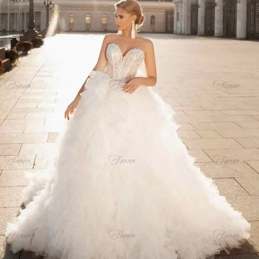 

Sweetheart Wedding Dresses New Lace Appliques Sequined Long Tulle Bridal Gowns Simple Backless Piping Ball Gown Robe de soirée