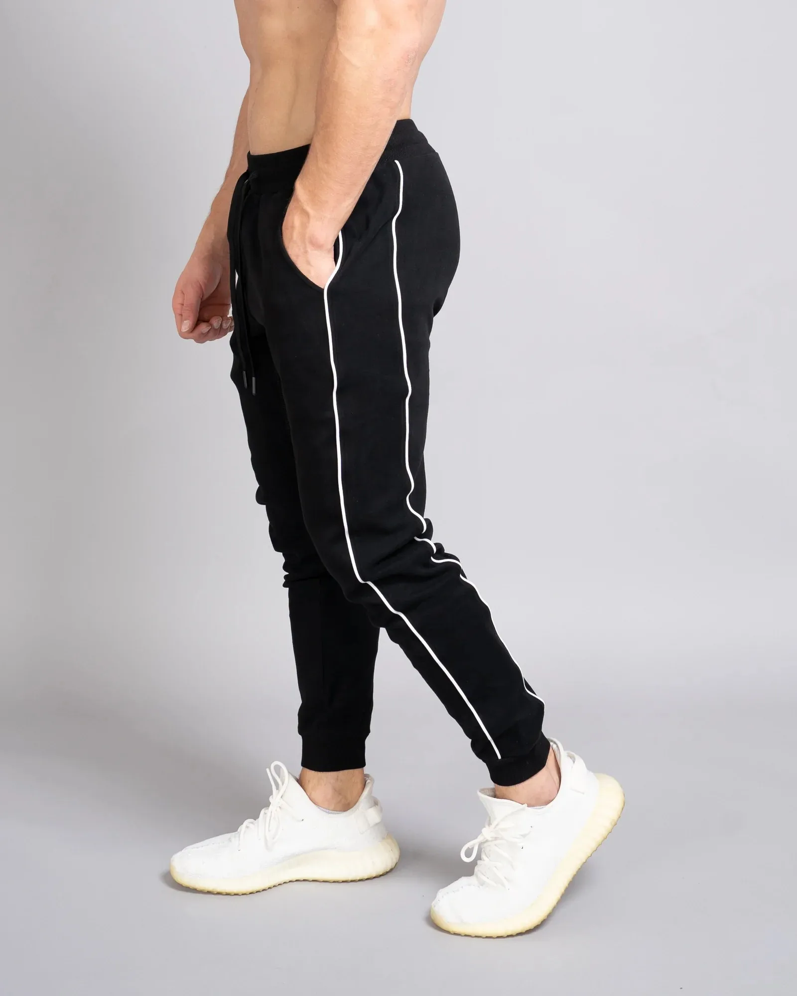 

2022 Men Sportswear Mens Joggers Casual Pants Fitness Tracksuit Bottoms Skinny Sweatpants Trousers Black Gyms Jogger Track Pants