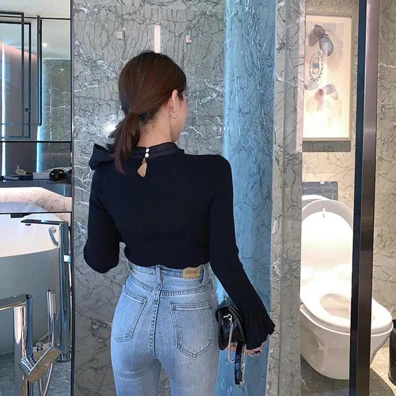 Женский пуловер в французском стиле с расклешенными рукавами и бантом