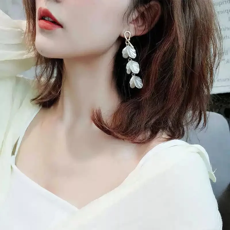 

925 silver needle romantic white petal fairy earrings Korean temperament personality all-match ear ladies long earrings