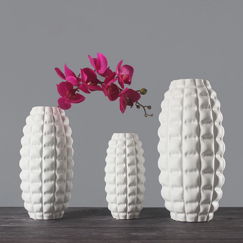 

Simple white ceramic vase creative home modern minimalist crafts home decorations large mouth vase flower arrangement