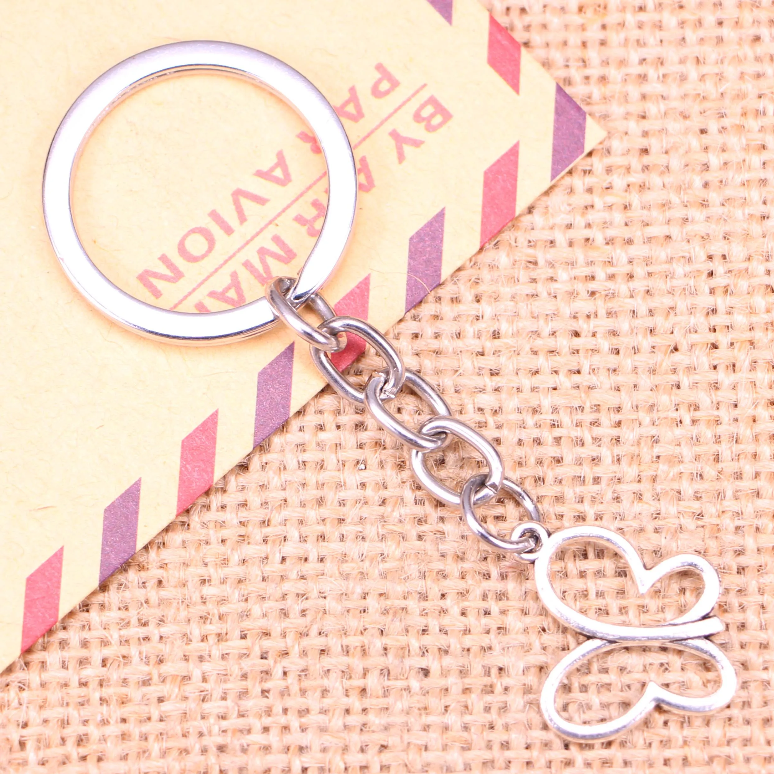 

20pcs New Fashion Keychain 20x19mm hollow butterfly Pendants DIY Men Jewelry Car Key Chain Ring Holder Souvenir For Gift