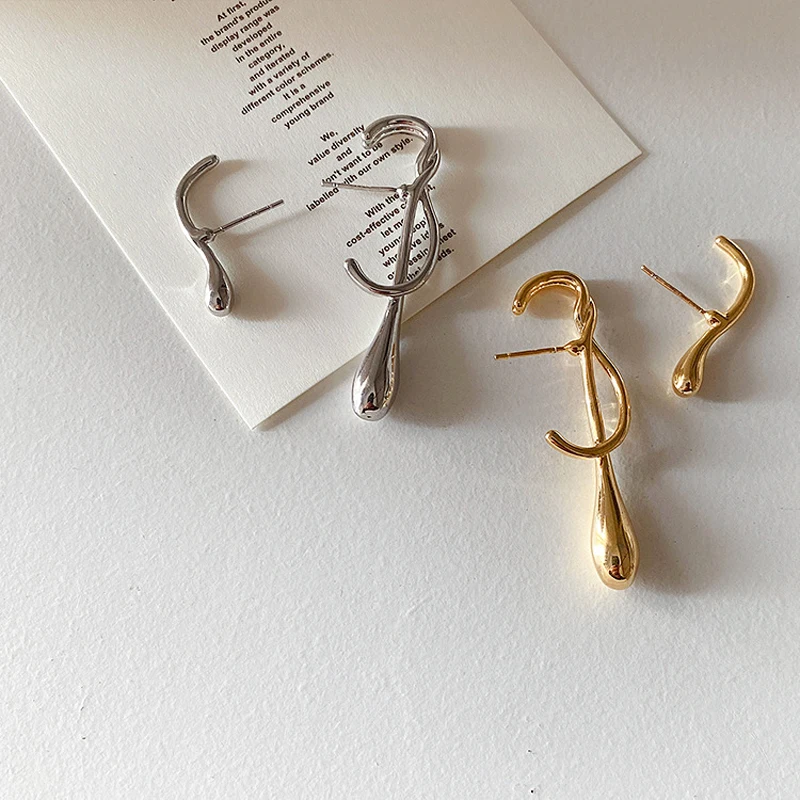 Европейские и американские модные крупные асимметричные серьги простые