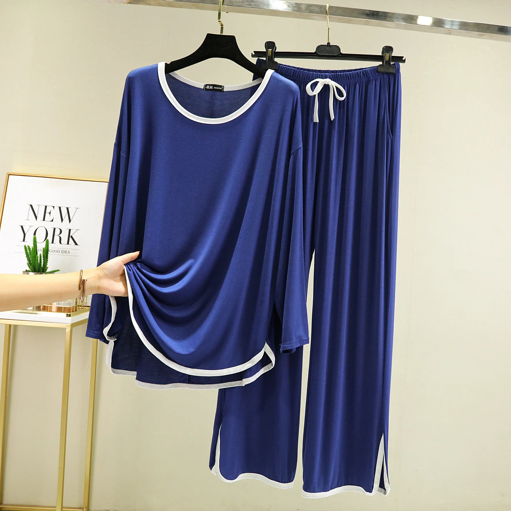 The new spring and autumn women's o-neck long sleeve T-shirt big pants open pocket matching individual householdwear comfortable