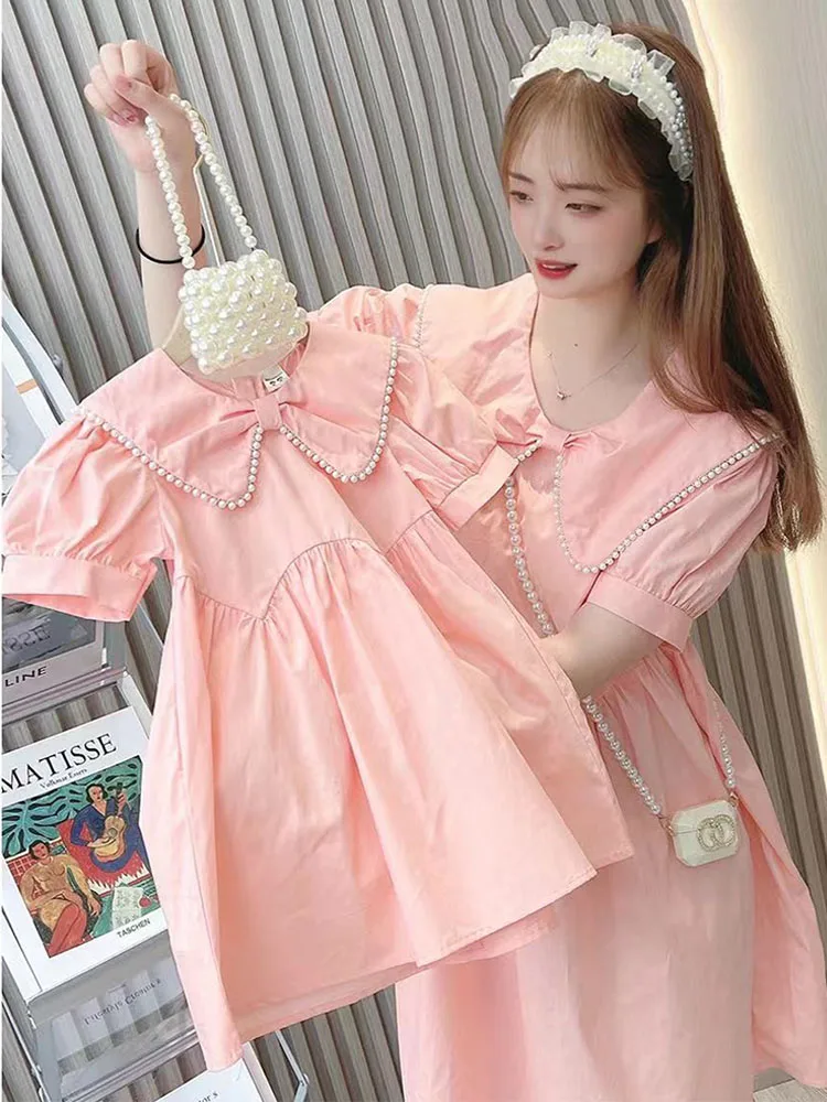 

2022 Summer New Small and Medium-sized Boys and Girls Korean Style Pearl Solid Color Dress girls clothes kids