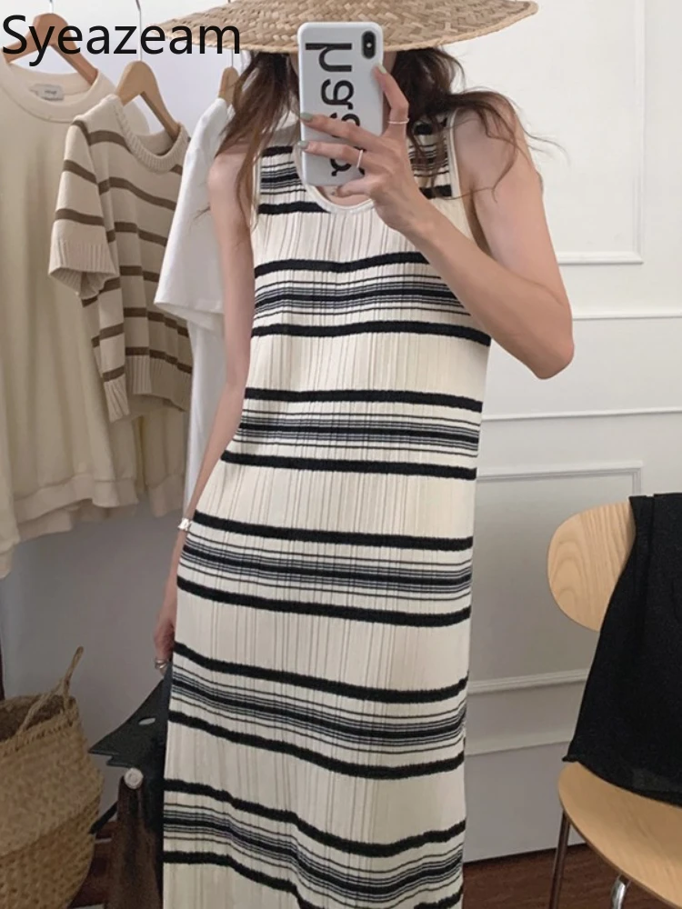 

Женское трикотажное платье в полоску, с круглым вырезом, до середины икры