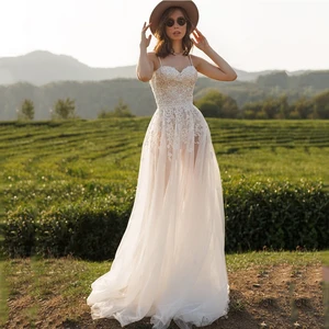 Boho Spaghetti Strap Wedding Dress 2022 Backless Beading Soft Tulle Lace Appliques Bridal Gown Sweep