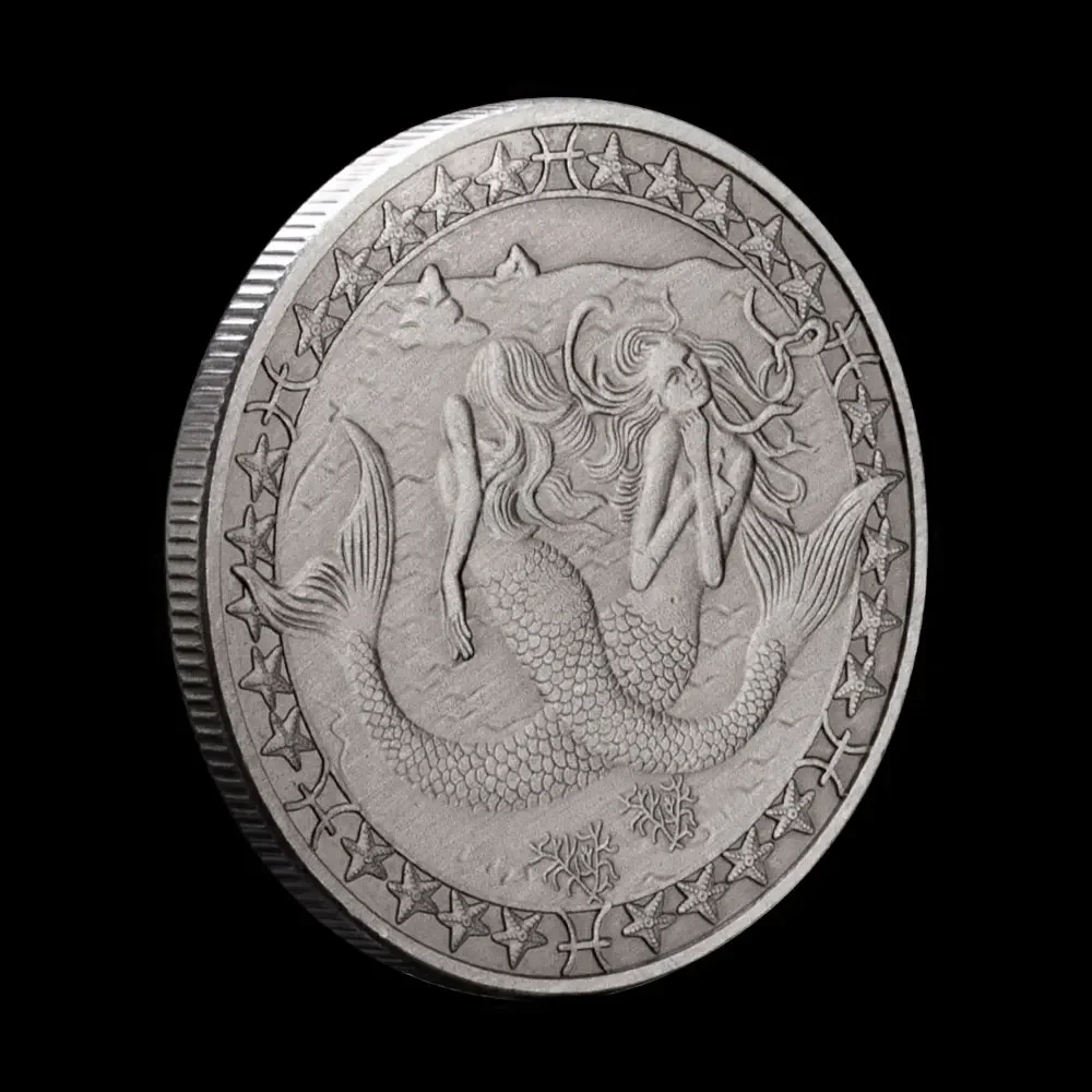 

Серебряная монета знак зодиака Рыбы