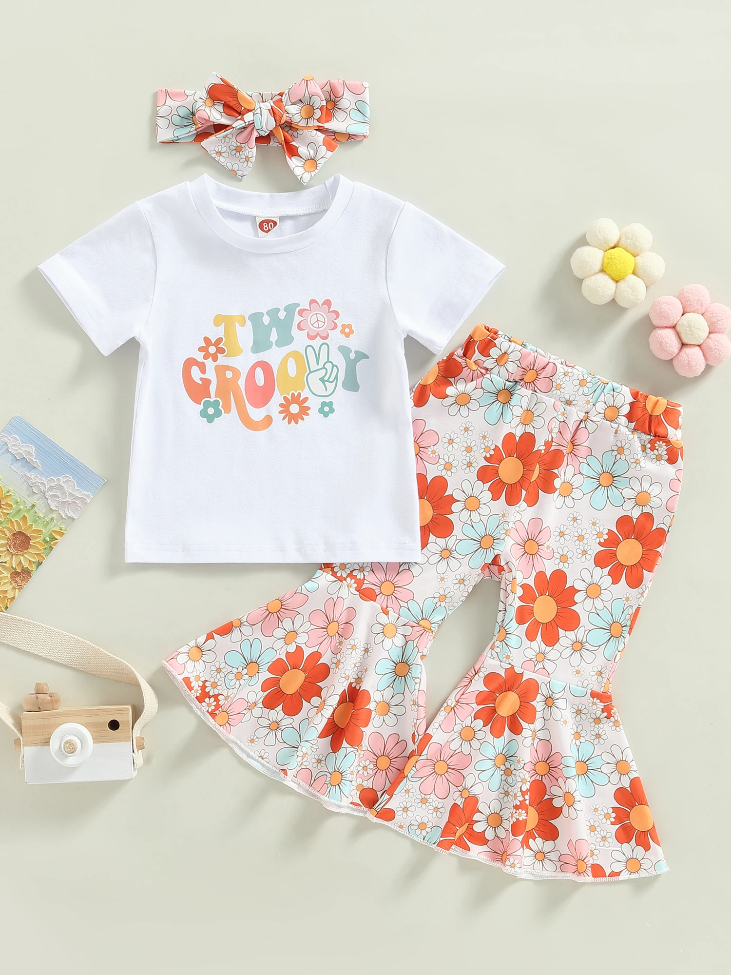 

Baby Girls 2-Piece Outfit Short Sleeve Crew Neck Letters Print T-shirt with Flower Print Flare Pants and Hairband