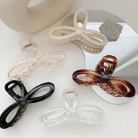 wholesale korean fashion 13cm plastic pure color transparent jumbo claw clips geometric bow tie strip hollow hair accessories
