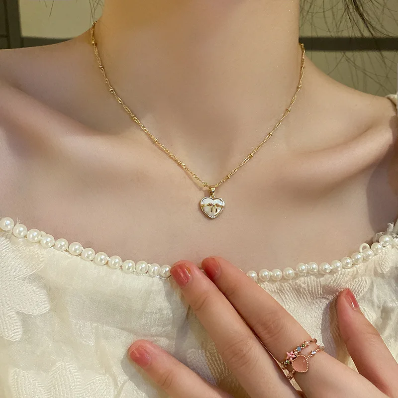 

Изящное ожерелье с подвеской в виде сердца для женщин, цепочка до ключиц, ожерелье с подвеской в виде сердца, в этническом стиле, оптовая про...