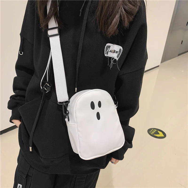 

Original Uoct.all Niche Design Ins Funny Expression Canvas Messenger Bag Female Cute Cartoon Bag Wild Mobile Phone Shoulder Bag
