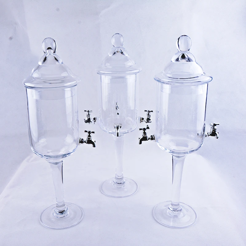 Стеклянный фонтан с двумя смесителями