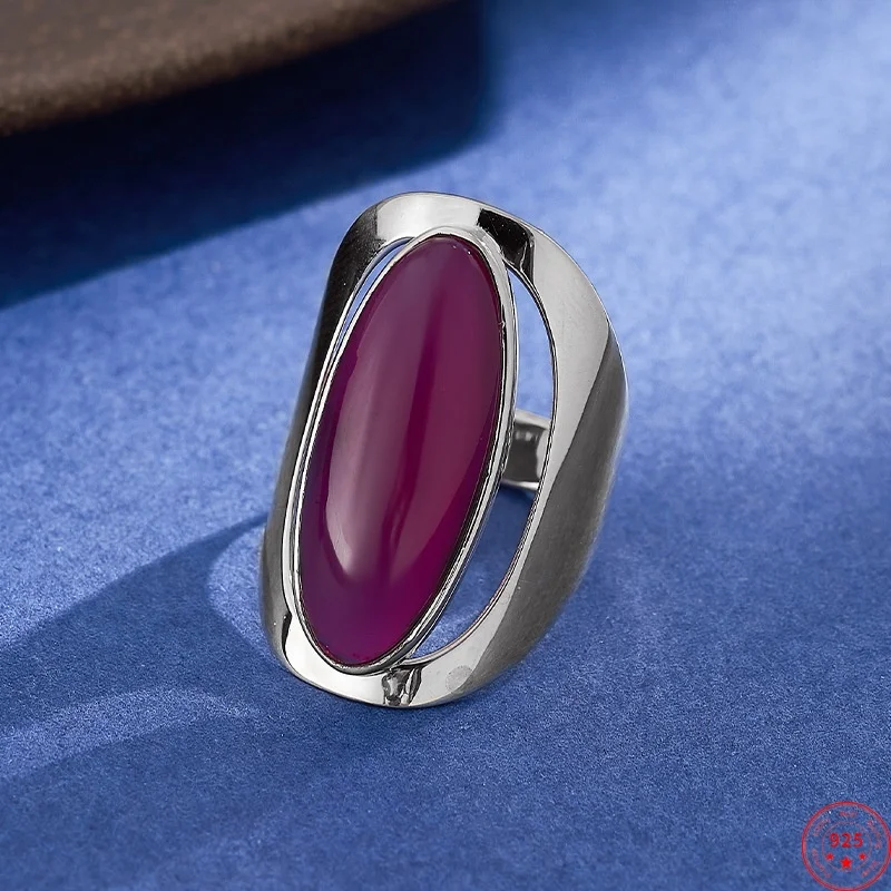 Серебряные кольца-подвески с красным корундом