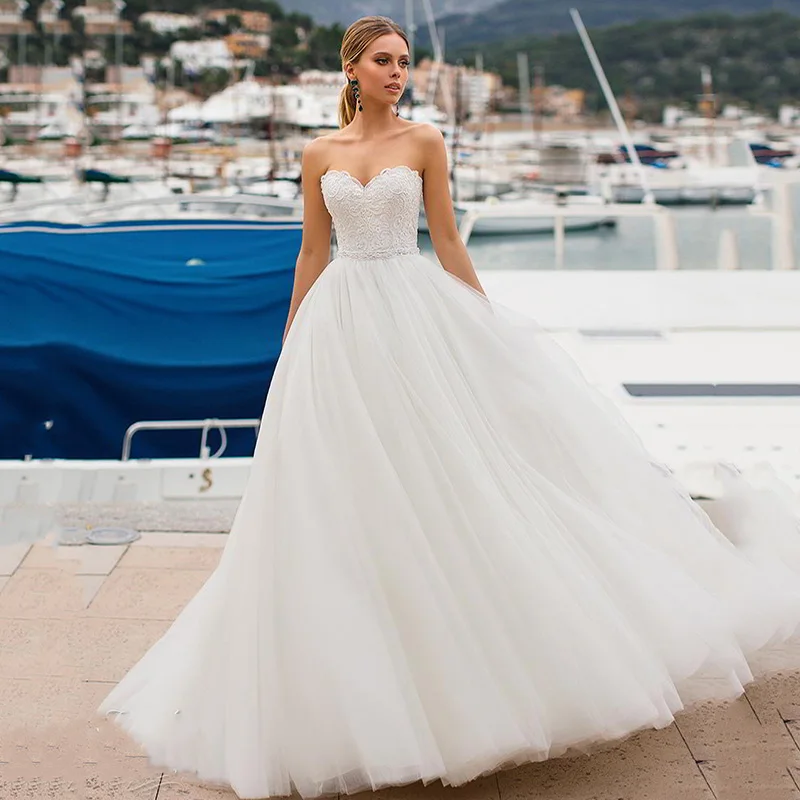 

Ruby Cheap Vogue Ball Dress Wedding Dress 2021 Sweetheart Auknia Slubna Lace-Up White Tulle Appliques Vestido novia
