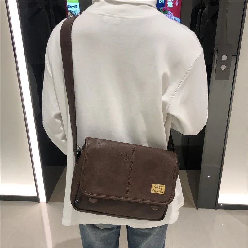 

fashion brand men's shoulder bag messenger bag casual high school students' book bag