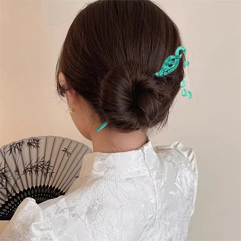 Металлическая зелёная заколка для волос в форме змеи