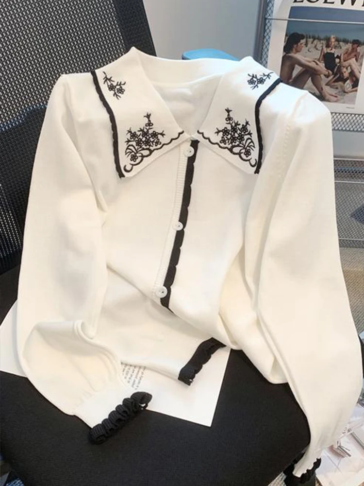 

Женский винтажный шикарный вязаный кардиган, свитер свободного кроя с лацканами, повседневная трикотажная одежда в Корейском стиле с вышив...