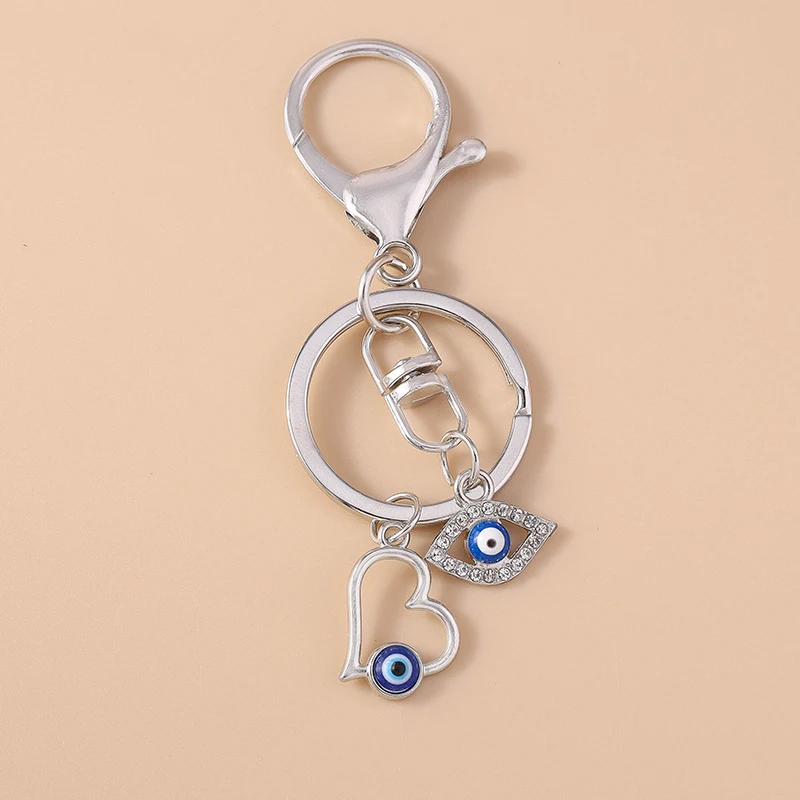 Металлический брелок Lucky Evil Eyes с бирюзовым камнем