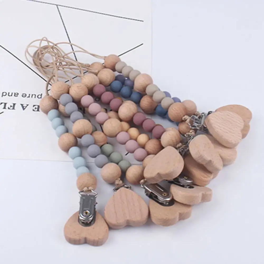 

Wood Beads Anti-drop Silicone Food Grade Star Clip Baby Pacifier Chain Nipple Holder Molar Chain Pacifier Clips Chains