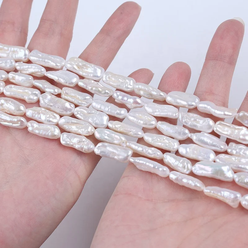 

Hot Sale 6-9mm Natural White Color Freshwater Biwa Pearl Strand Straight Drilled Hole