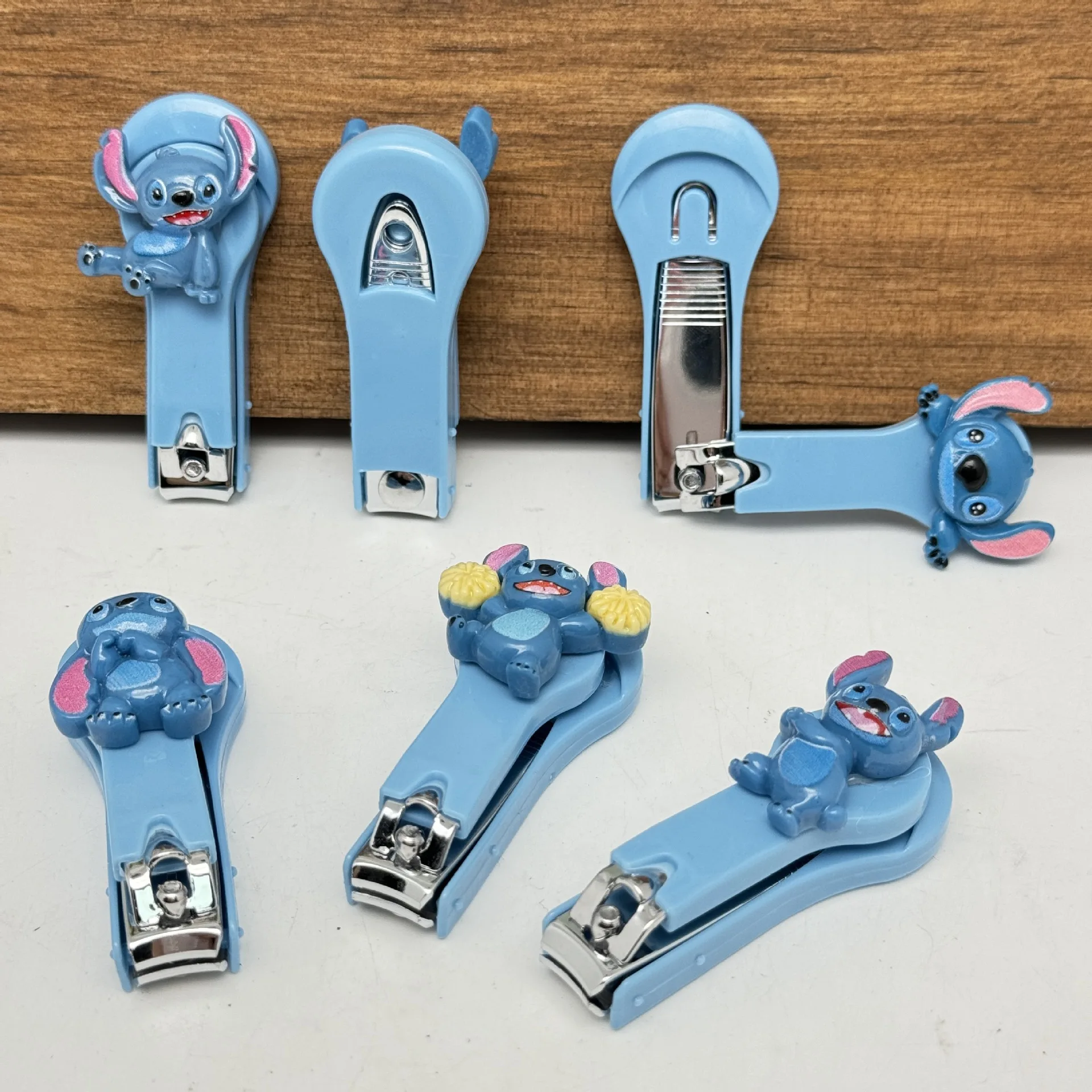 Фото Disney Loli and Stitch, зажимы для ногтей, милые стички, аниме-фигурки, товары для дома, ножницы для ногтей из нержавеющей стали, игрушки, подарки №5
