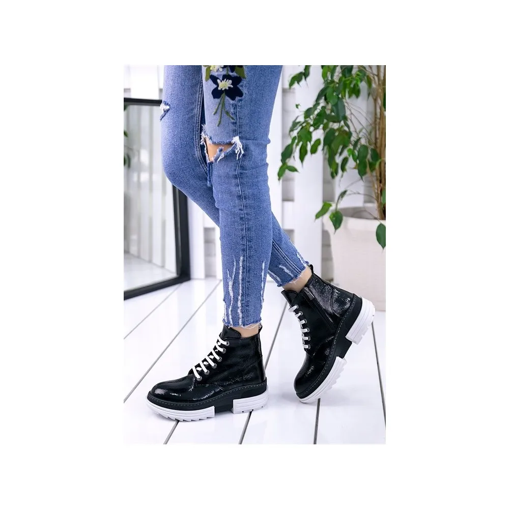 

Dorlie Corina Black Japanned Leather White Soled Boots