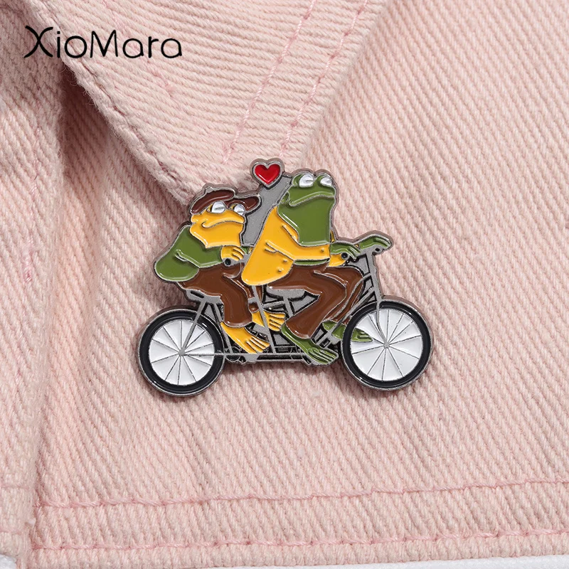 

Frog and Toad Go Biking Enamel Pin Cartoon Creative Funny Animal Brooch Lapel Backpack Badge Jewelry Gift For Friends