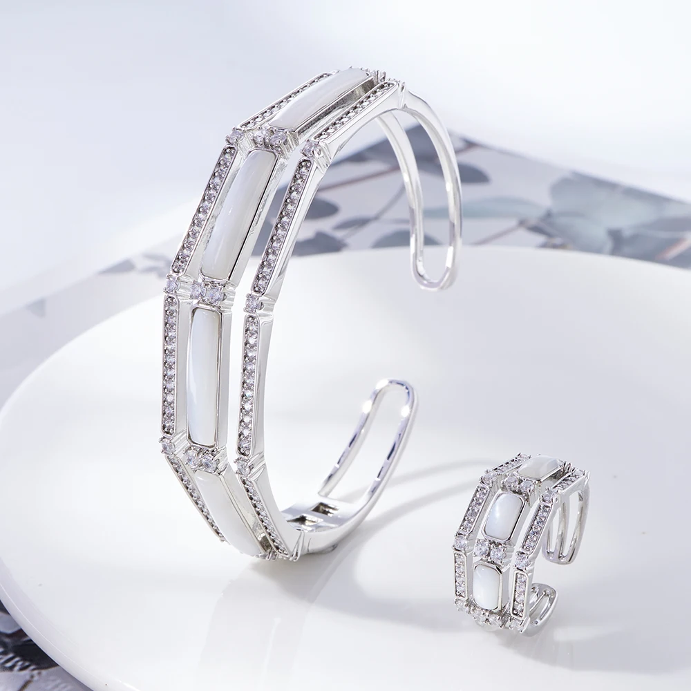 Женский комплект из браслета и кольца с фианитами