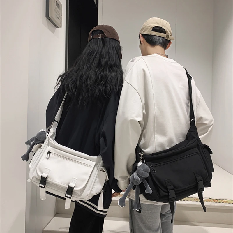 

Canvas Crossbody Bags for Men Women Fashion Large Capacity Shoulder Bag High School College Student Messenger Bag with Pendant