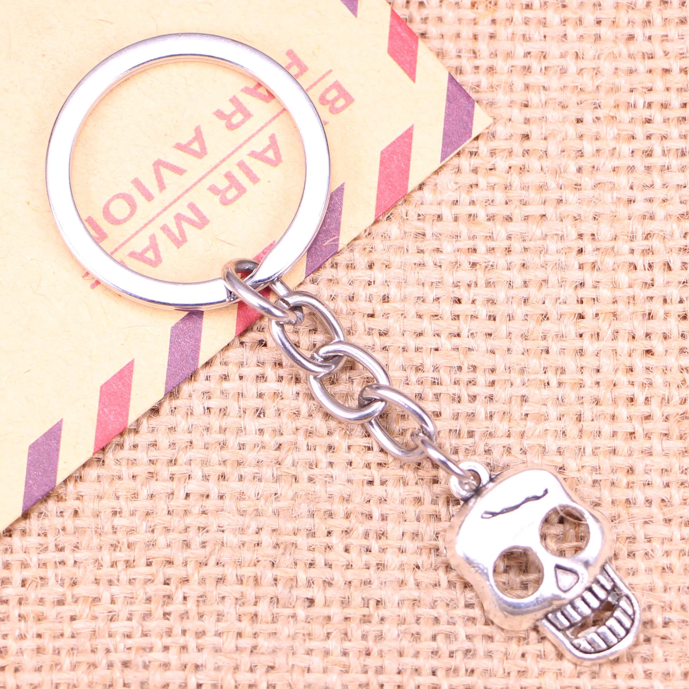 

20pcs New Fashion Keychain 23x12mm skeleton skull Pendants DIY Men Jewelry Car Key Chain Ring Holder Souvenir For Gift