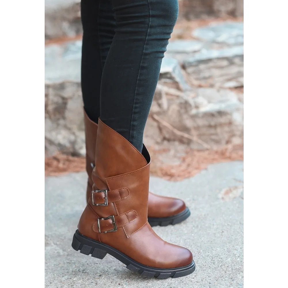 

Dorlie Nila Tan Skin Boots