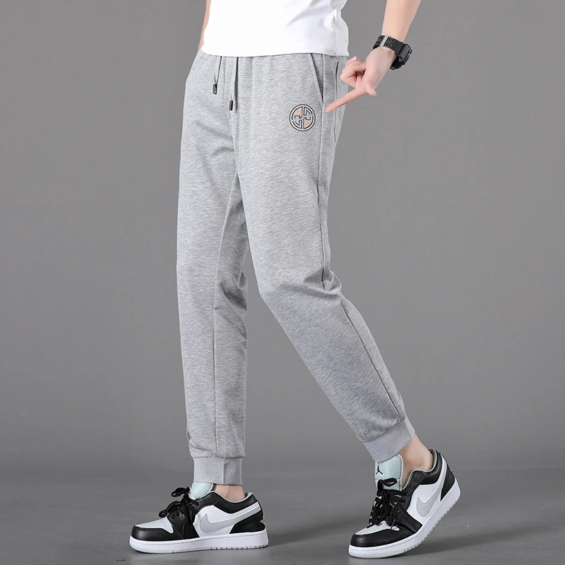 

Spring and Autumn New Casual Pants Men's Korean-Style Trendy Loose Tappered Harem Pants Men's Printed Sweatpants Trousers