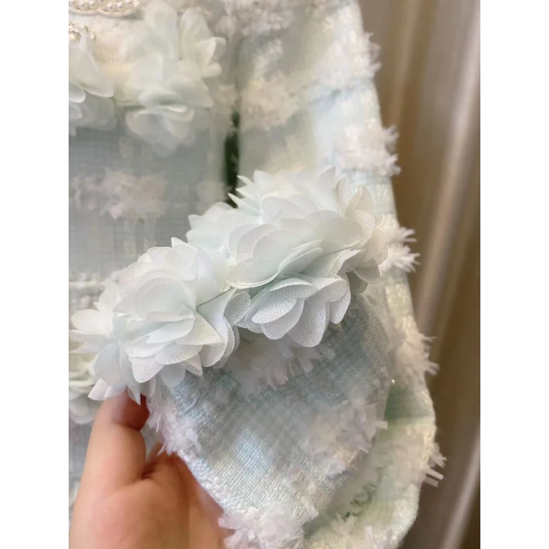 Рисунок 5 - Женское короткое пальто в клетку