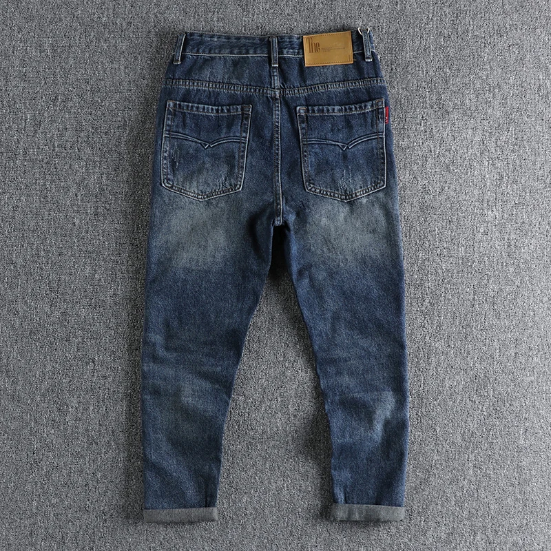 Impressed pattern heavy retro trend high street jeans men have to make old holes patch young daddy pants.