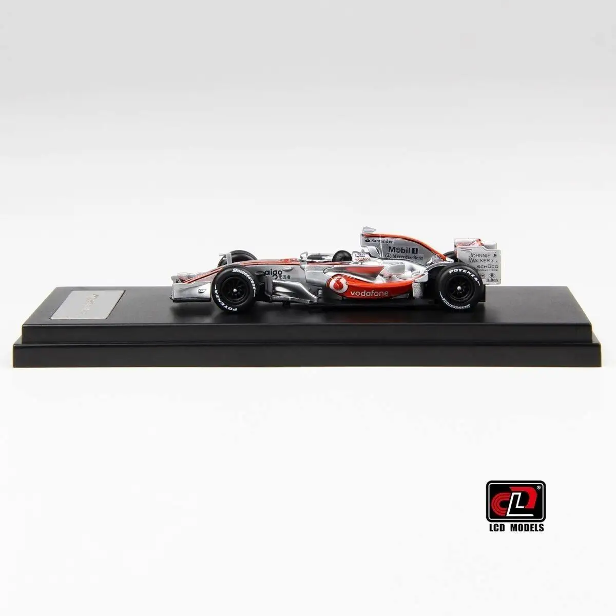 Модель гоночного автомобиля McLaren MP4-23 в масштабе 1:64 из литого металла с ЖК-дисплеем (art.: 3920db2e4de11) - 3920db2e4de11