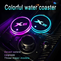 7 colors led luminous coasters cup holder for bmw x5 2009 2010 2015 2017 2021 car logo auto accessories 2 pcs atmosphere light