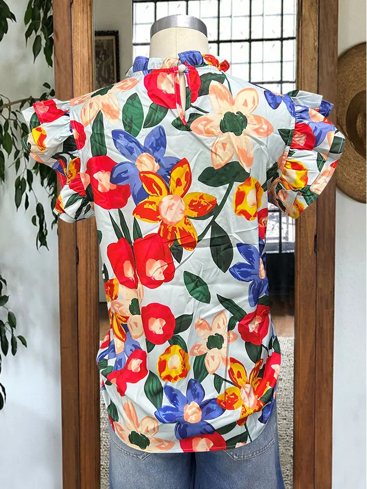 Разноцветная блузка с цветочным принтом и рюшами на рукавах многоуровневая