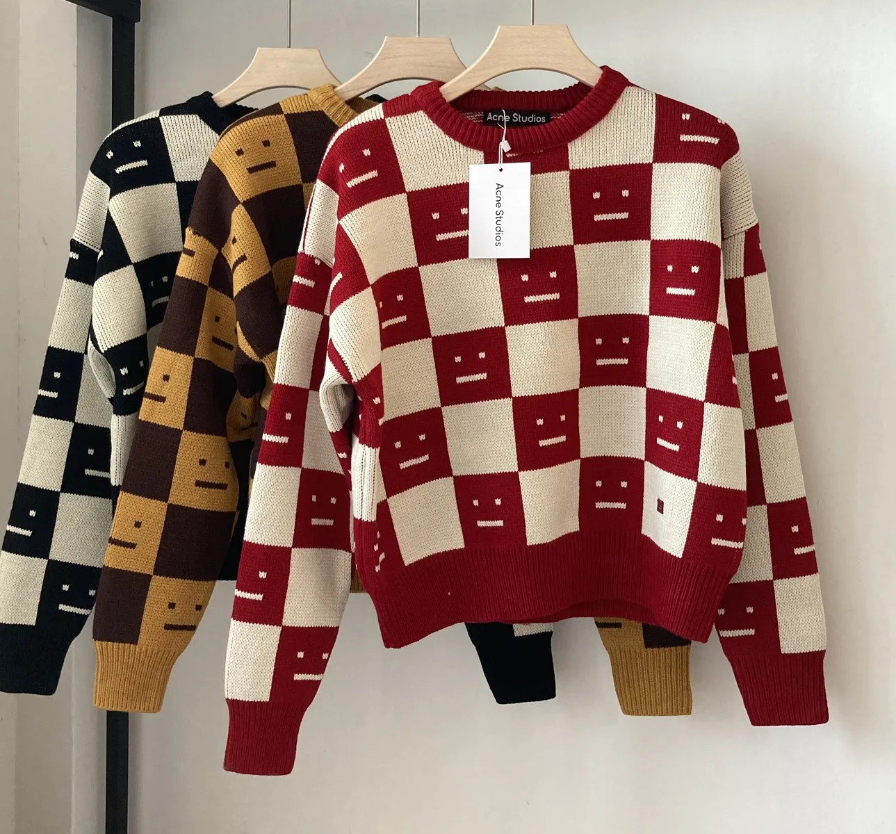 

Acne studios autumn and winter new square smiling face chessboard knitted Plaid round neck sweater Unisex