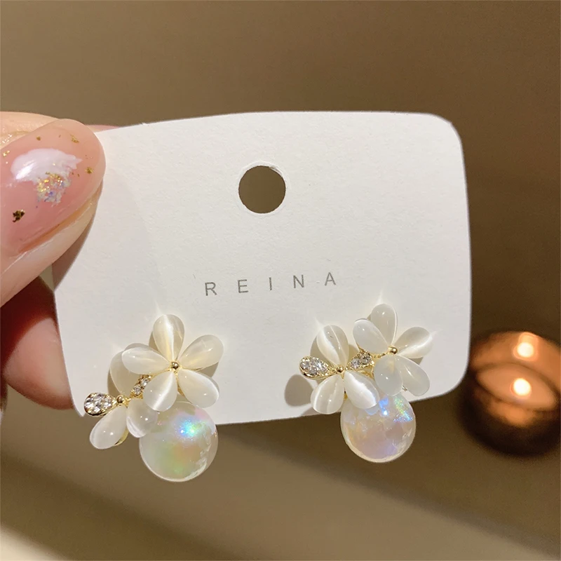 

Pearl earrings female summer 2022 new tide earrings niche design sense of senior ear clips without ear holes female earrings