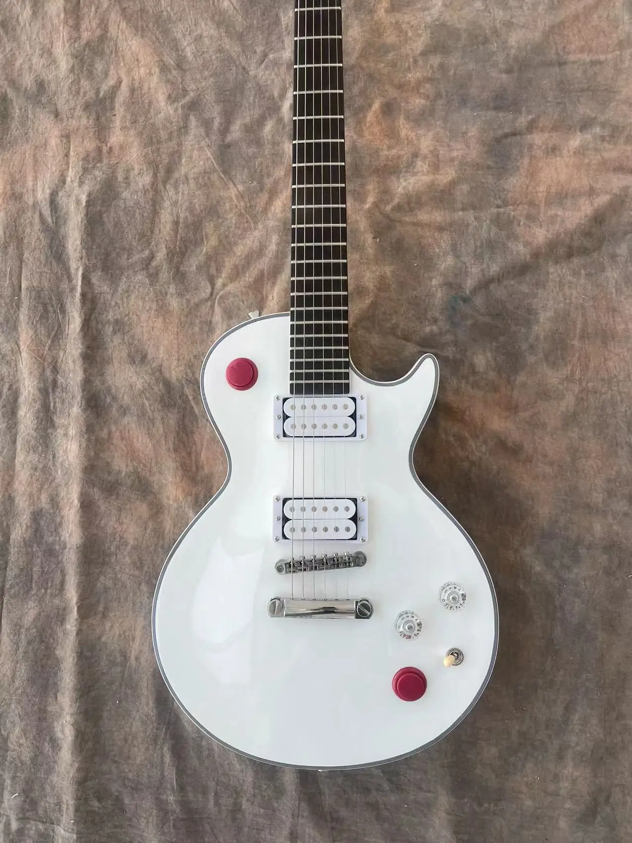 White six string LP electric guitar. We can customize any style of guitar and bass |