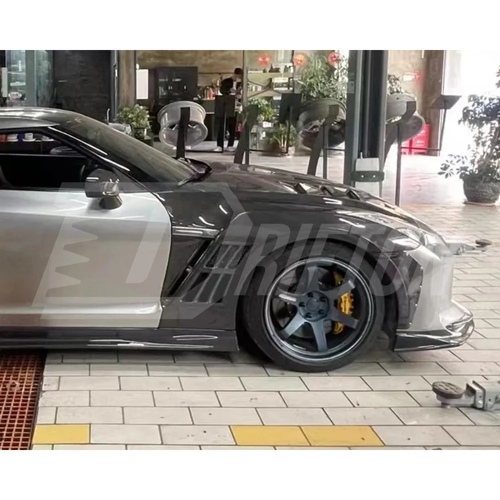 Фото Карбоновый обвес TopSecret Style для Nissan R35 GTR (крылья) №3